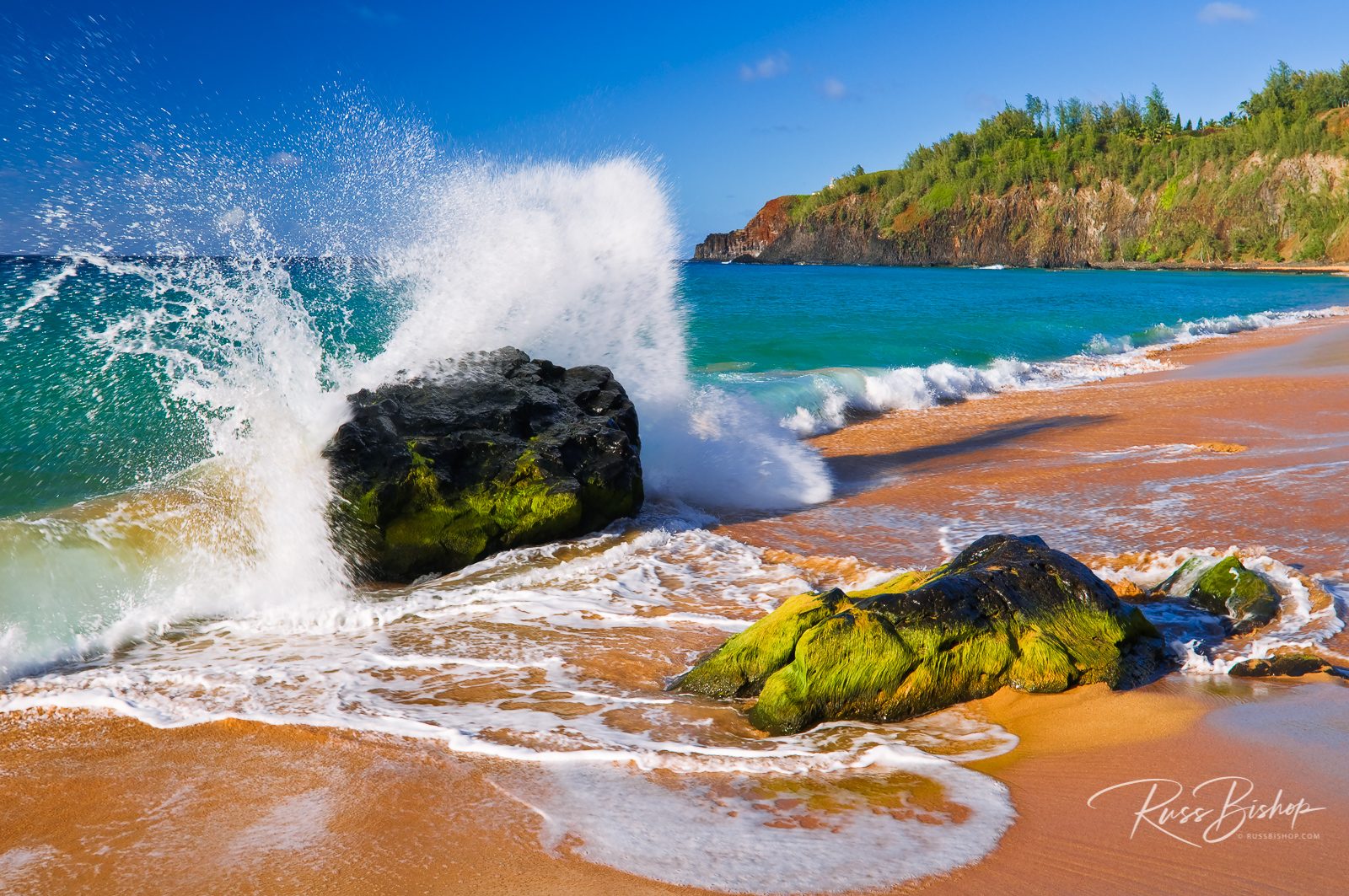 Surf crashing on rocks at Secret Beach, Kauai, Hawaii 
