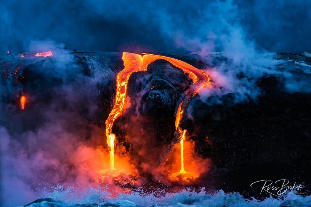 Pele's Realm. Lava flow entering the ocean at dawn, Hawaii Volcanoes National Park, Hawaii